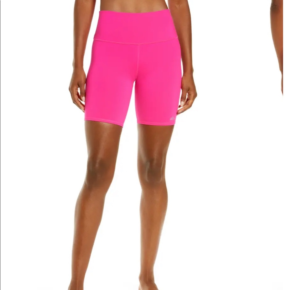 Brand new alo biker shorts in bright pink, size medium